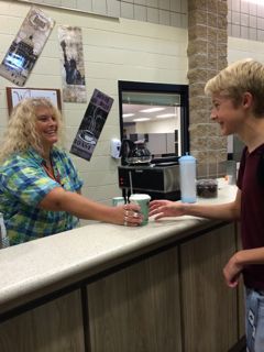 Volunteers greet High School students with a smile everyday!