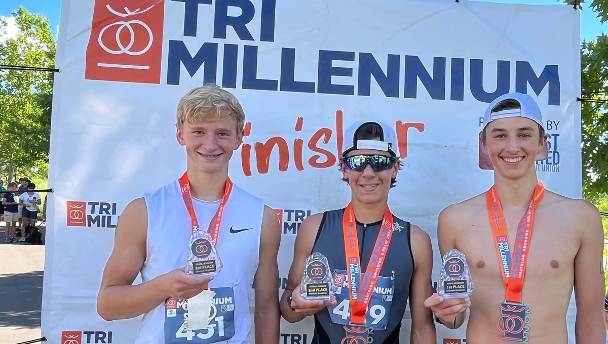 Carson McIntire, Josh Langeland and Evan Kraker pose after finishing 1, 2, 3 in their division.